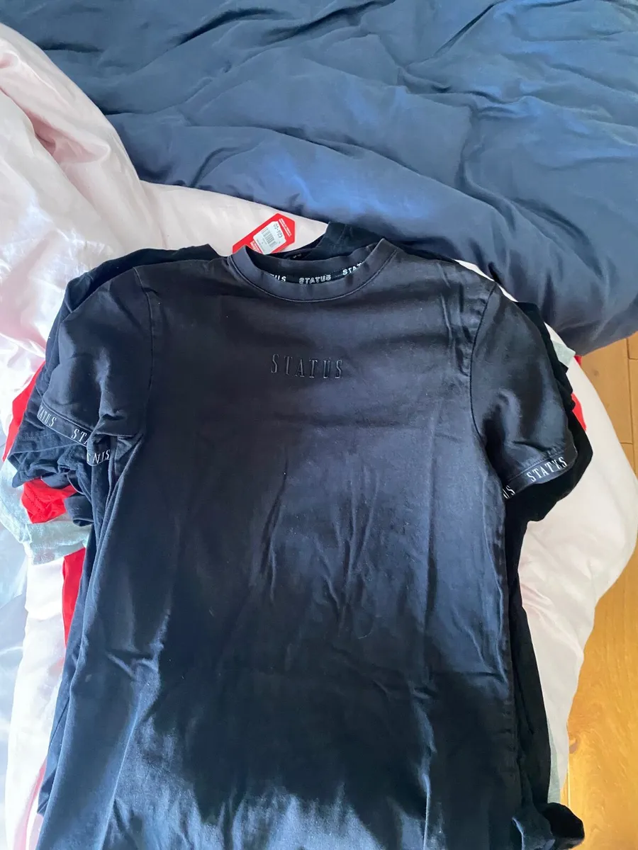 1 mcenzie and 1 status t shirts - Image 1
