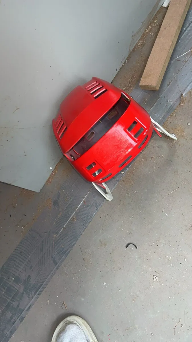 Red hurling helmet - Image 1