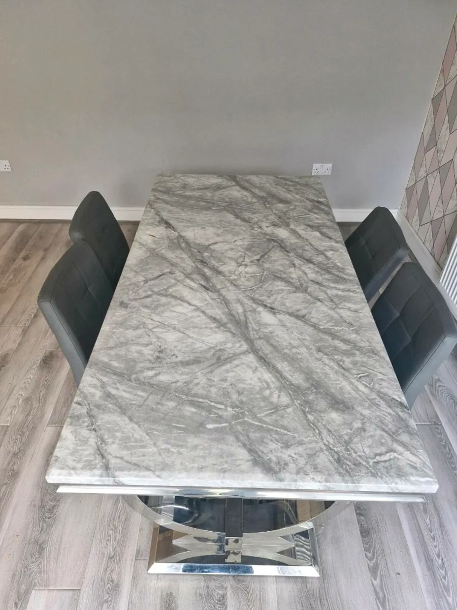 Grey marble dining table and chairs