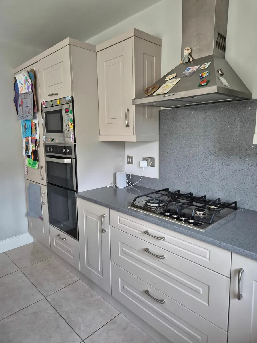 Kitchen cabinets, quartz counter top and appliance - Image 1
