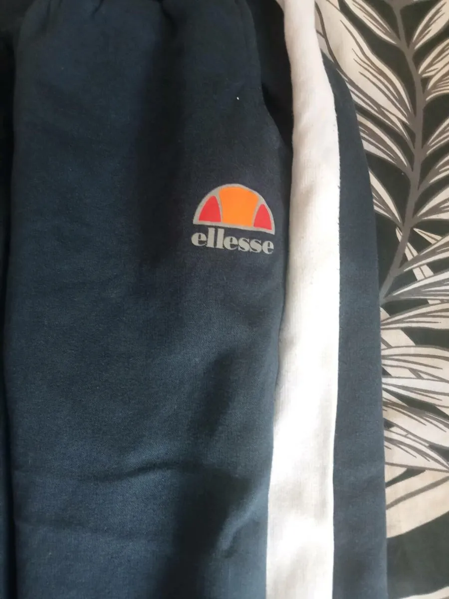 Ladies tracksuits fila and elesse size 8 - Image 4