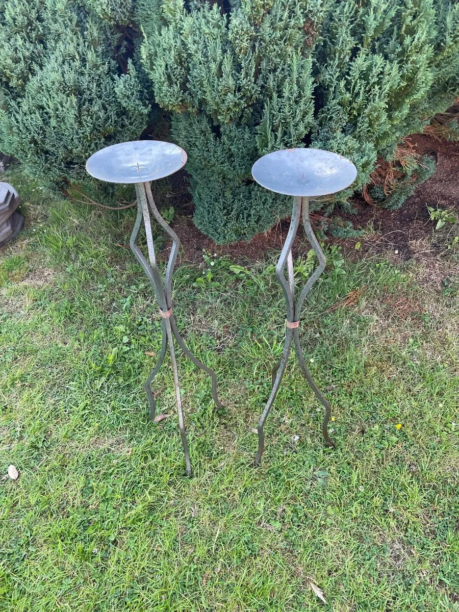 2 cast iron candle holders set