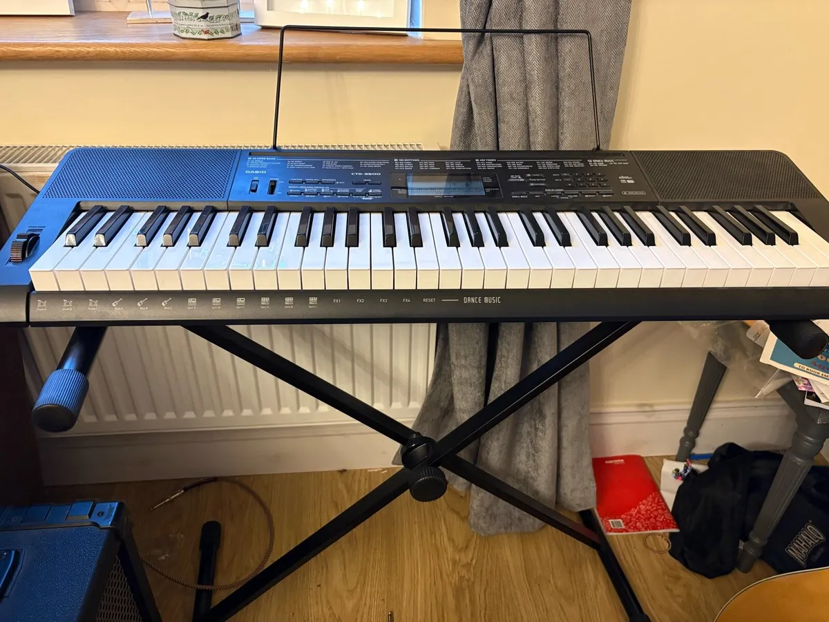 Casio keyboard and stand - Image 1