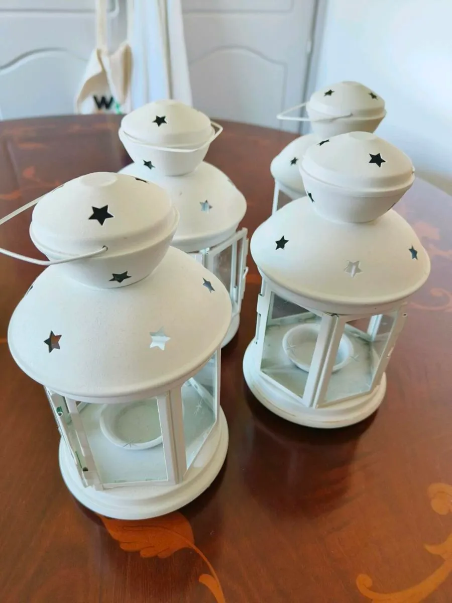 4 cream lanterns