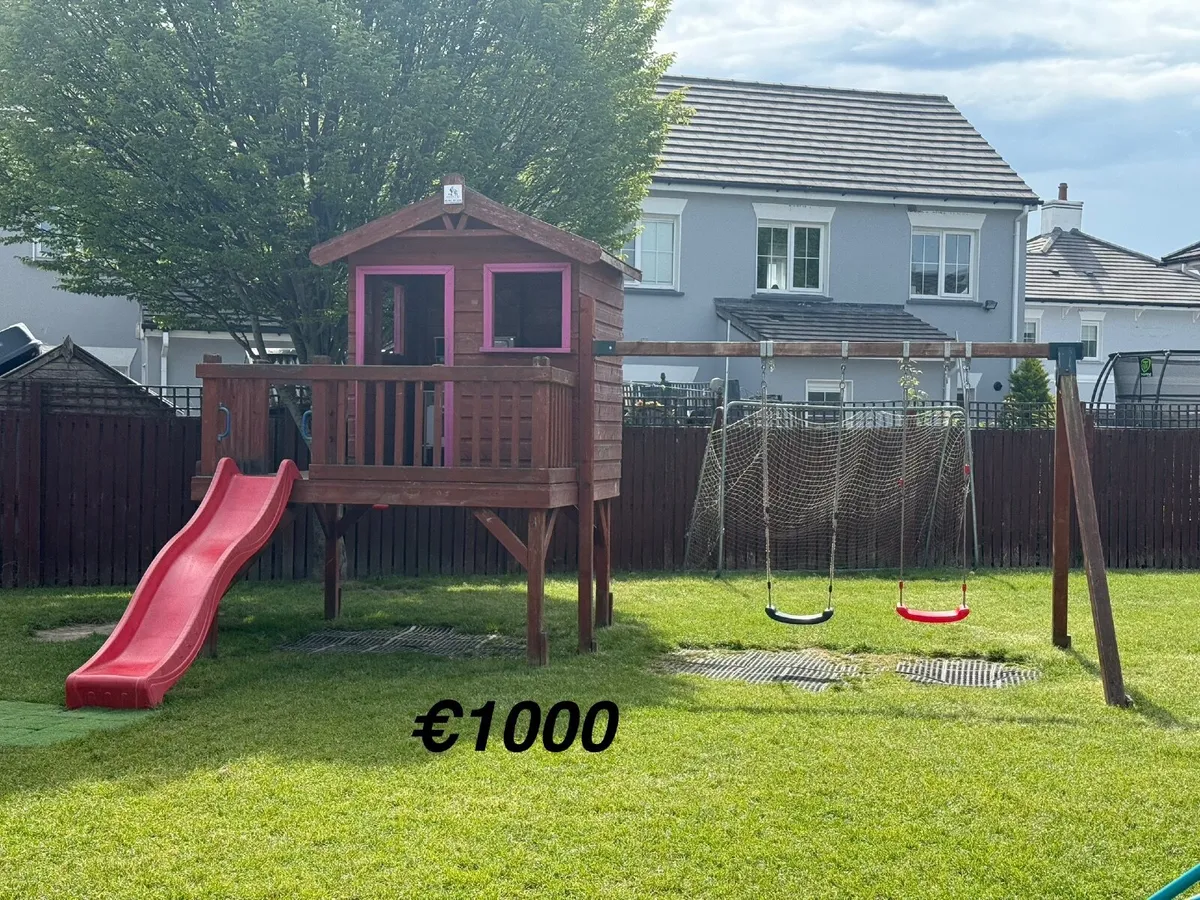 Garden Playhouse with swings & slide - Image 1