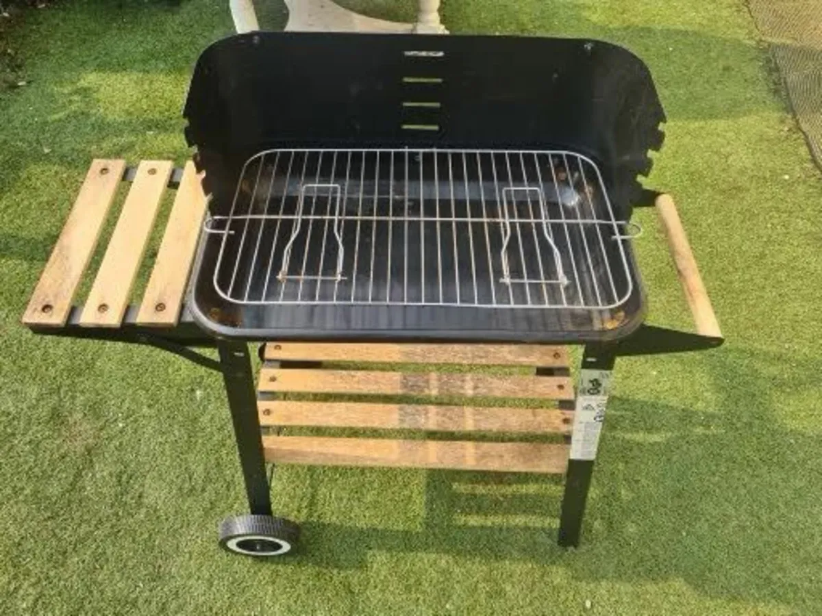 Small BBQ with bag of coals