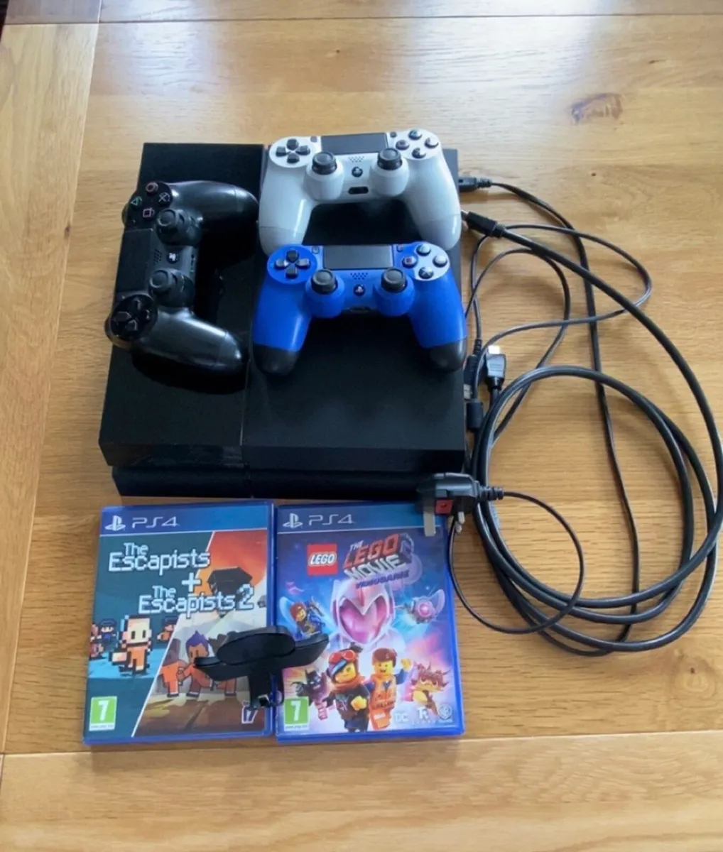 PlayStation 4 Pro with 3 DualShock Controllers - Image 1