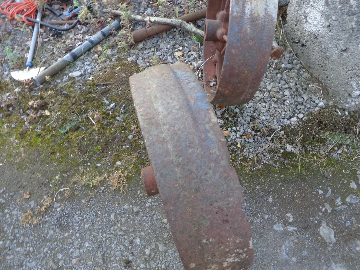 vintage heavy cast iron wheels - Image 1