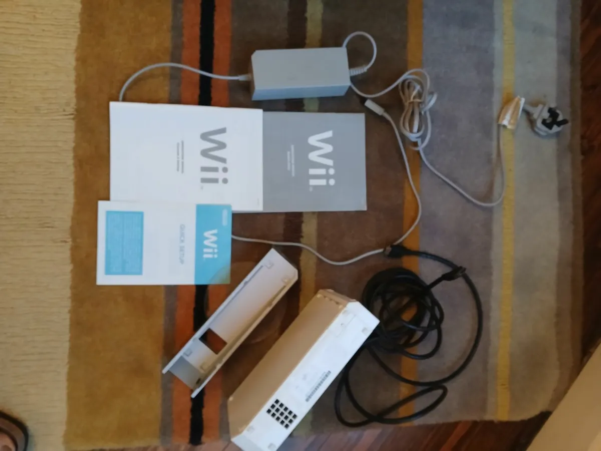 WII console and cables plus controllers and WII sp - Image 2
