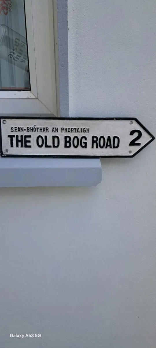 The old bog road cast iron sign