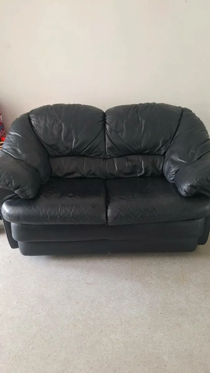 2 seater black leather sofa - can deliver - Image 1