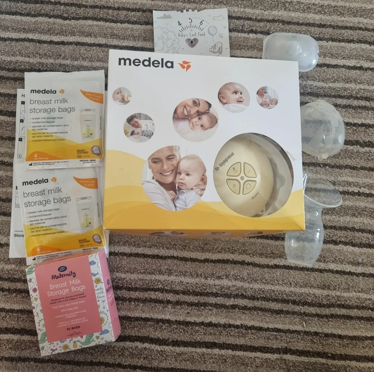 Medela Breast Pump and Bottles - Image 1