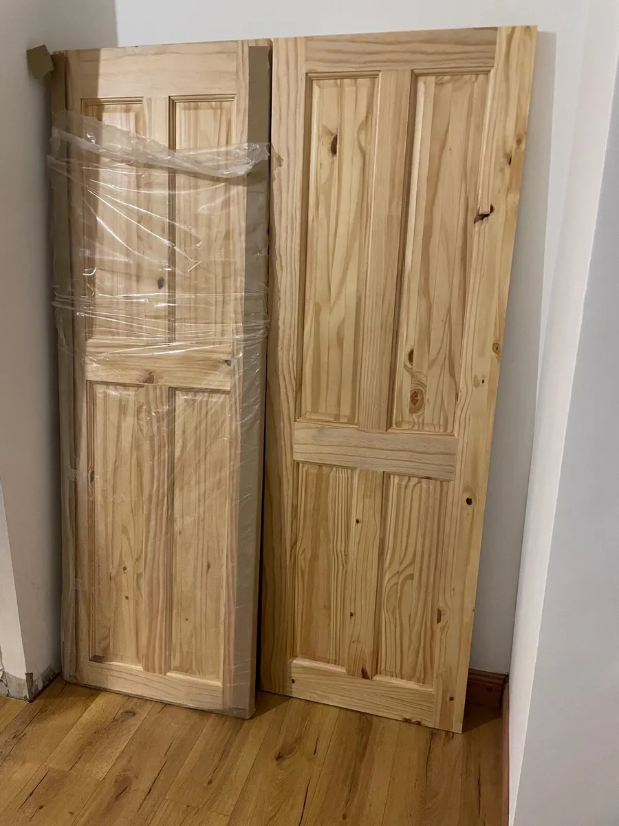2 brand new doors pine in pack - Image 1