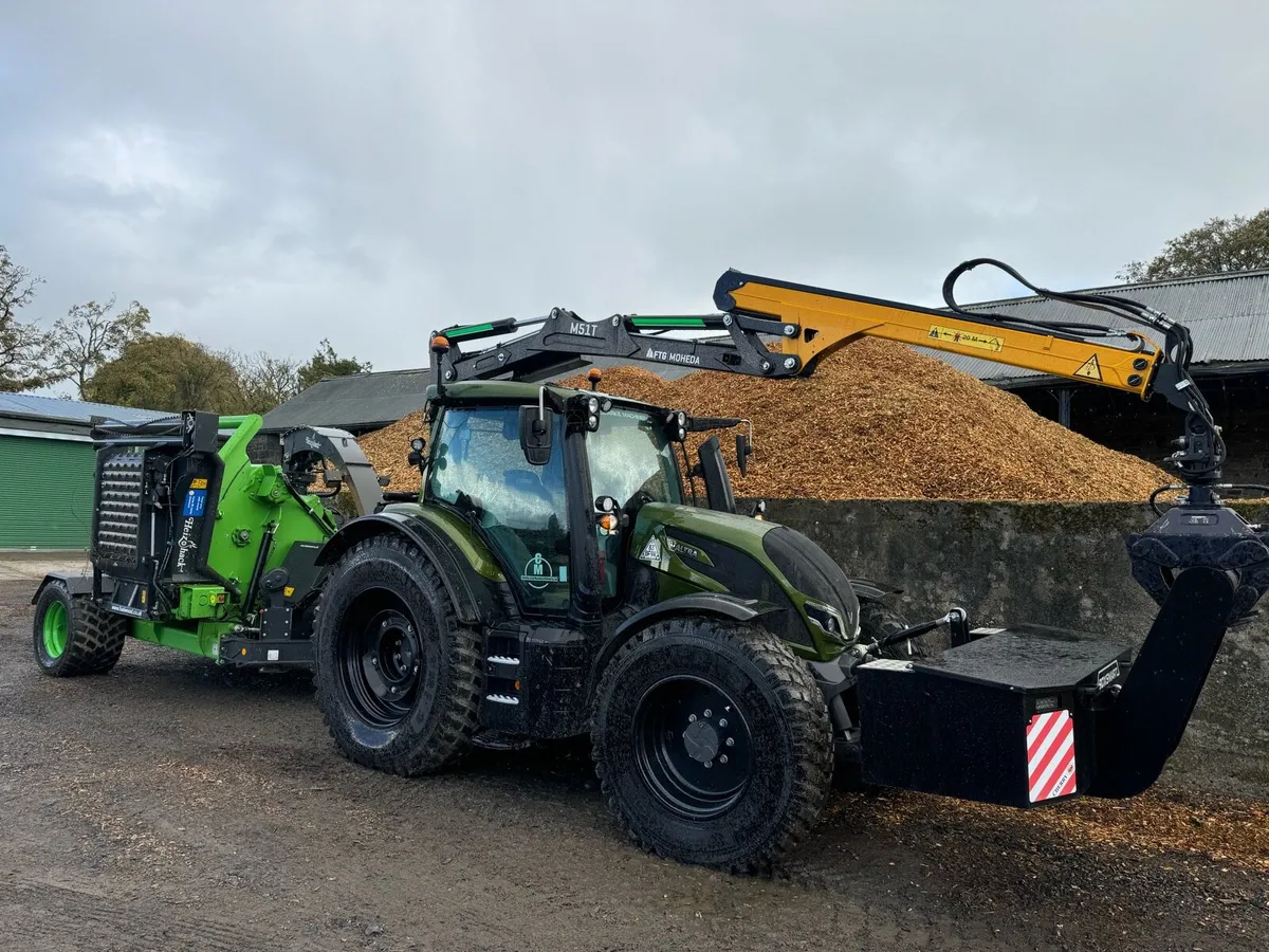 Tractor and chipper - Image 1