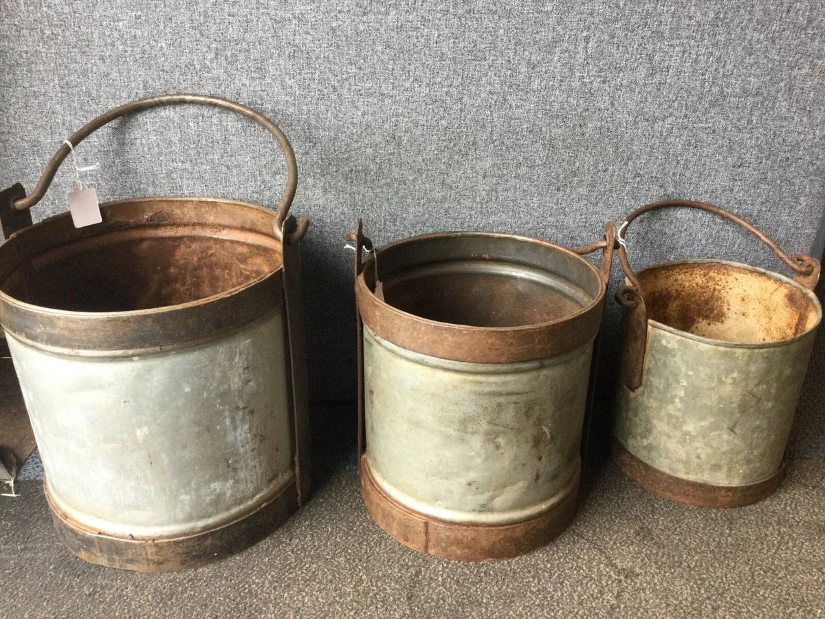 The trio of graduated zinc buckets