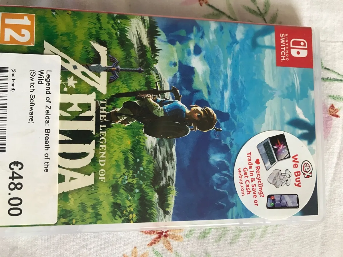Nintendo Switch and game Breath of the wild.