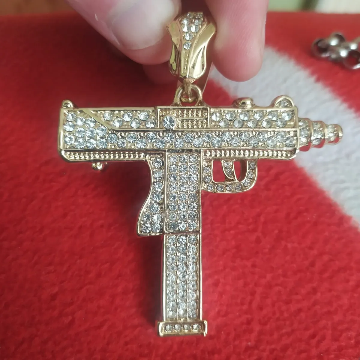 Uzi pendant bling..