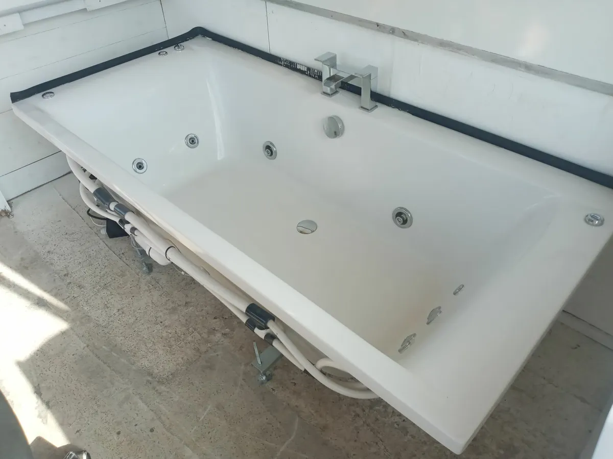 Delivery - Large Jacuzzi Bath with Taps - Image 1