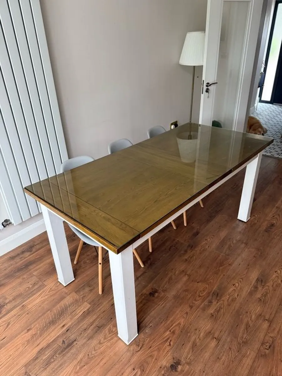 Modern Extendable Dining Table with Glass Top & Wooden Base - Arnott's (Seats 6-10) - Image 1