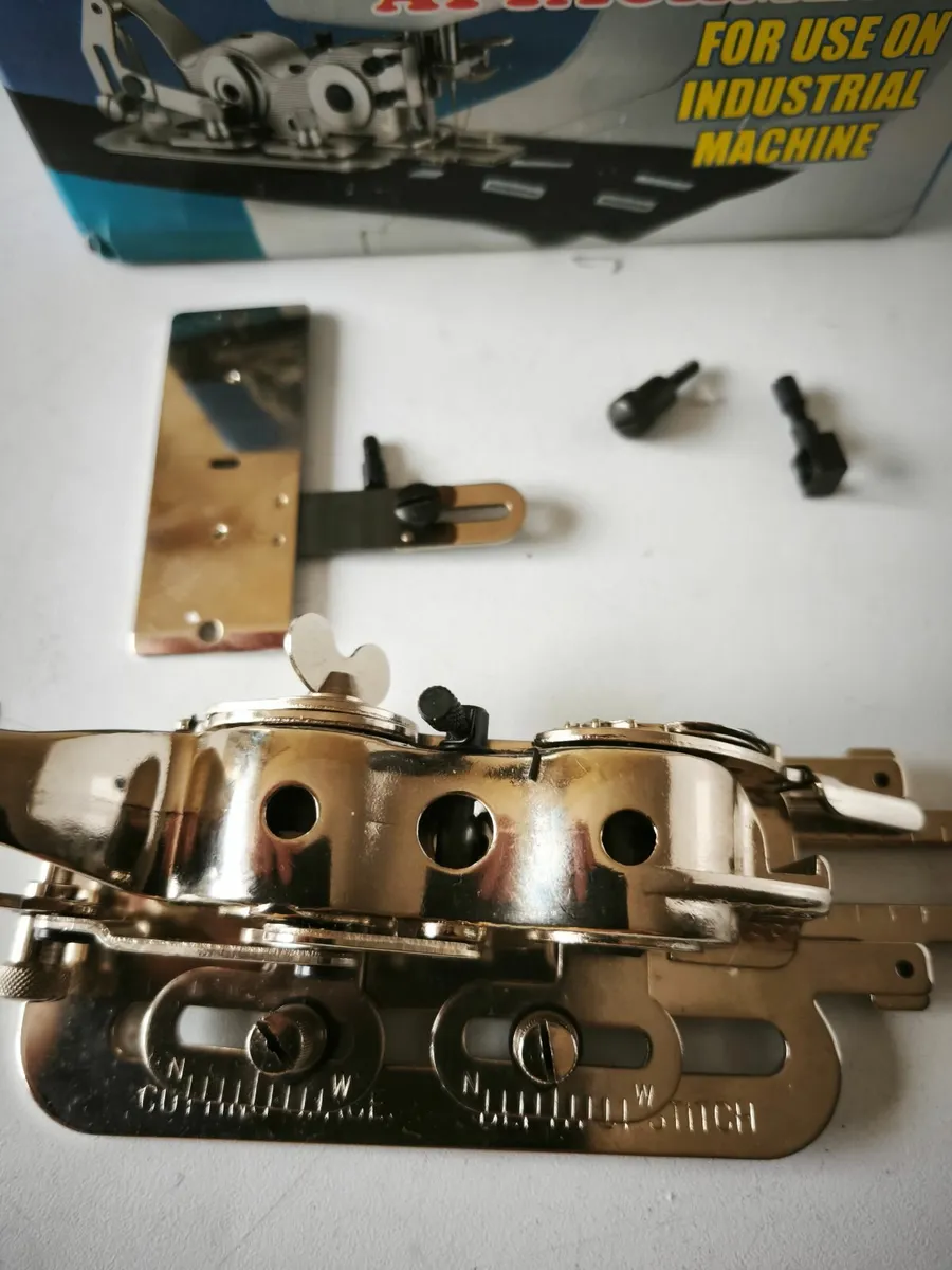 A button hole attachment.