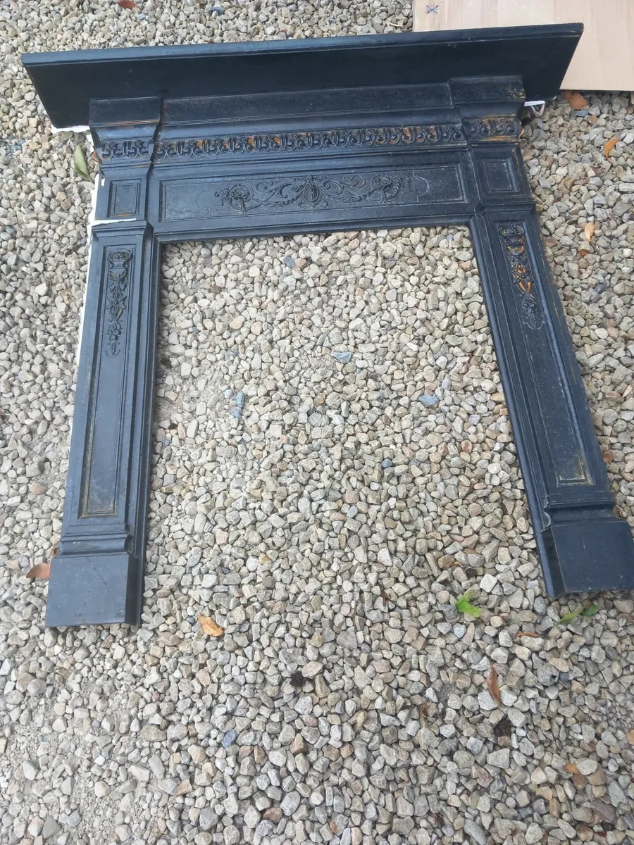 Black iron fireplace surround for quick sale - Image 1