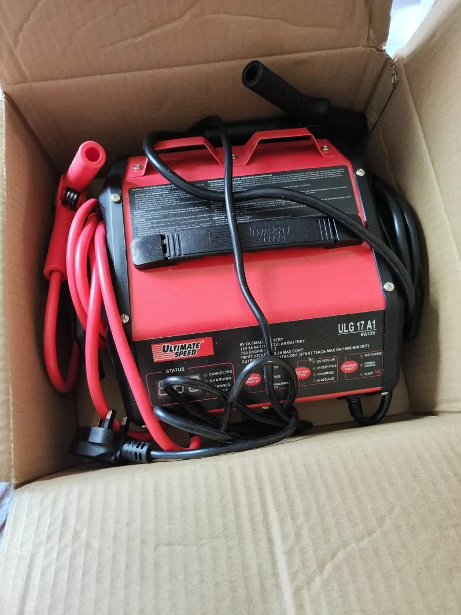 Car Battery and Jump Starter - Image 1