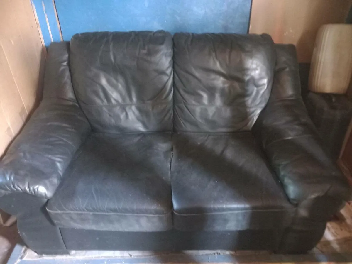 Two seater black leather couch. - Image 1