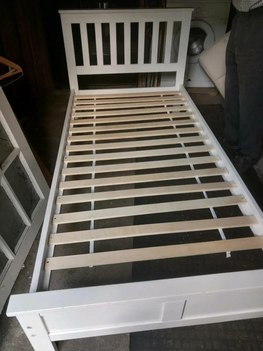 Single white bed frame. - Image 1