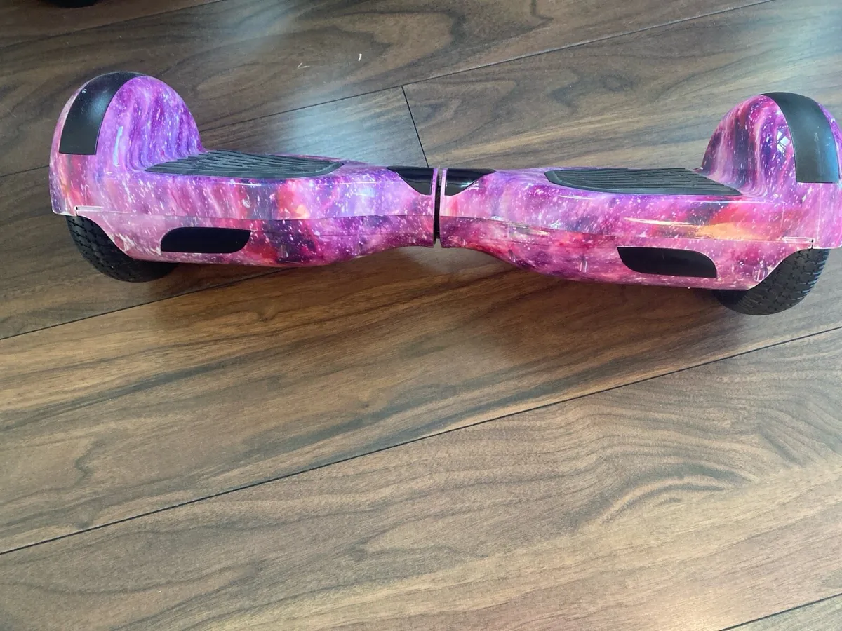 Galaxy purple hoverboard with charger - Image 1