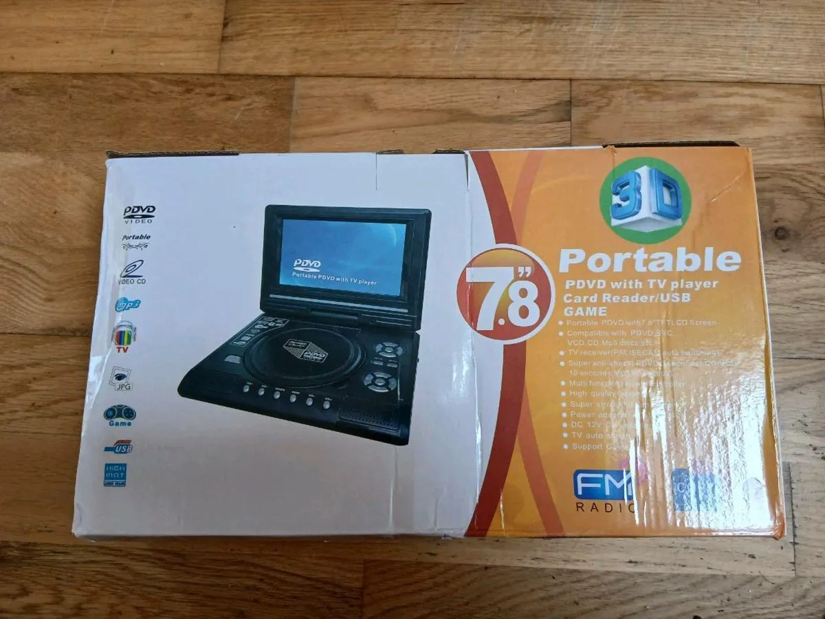 Mini tv dvd player including 300games can deliver - Image 1