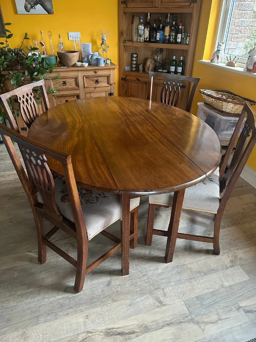 Antique hardwood dining table & embroidered chairs - Image 1