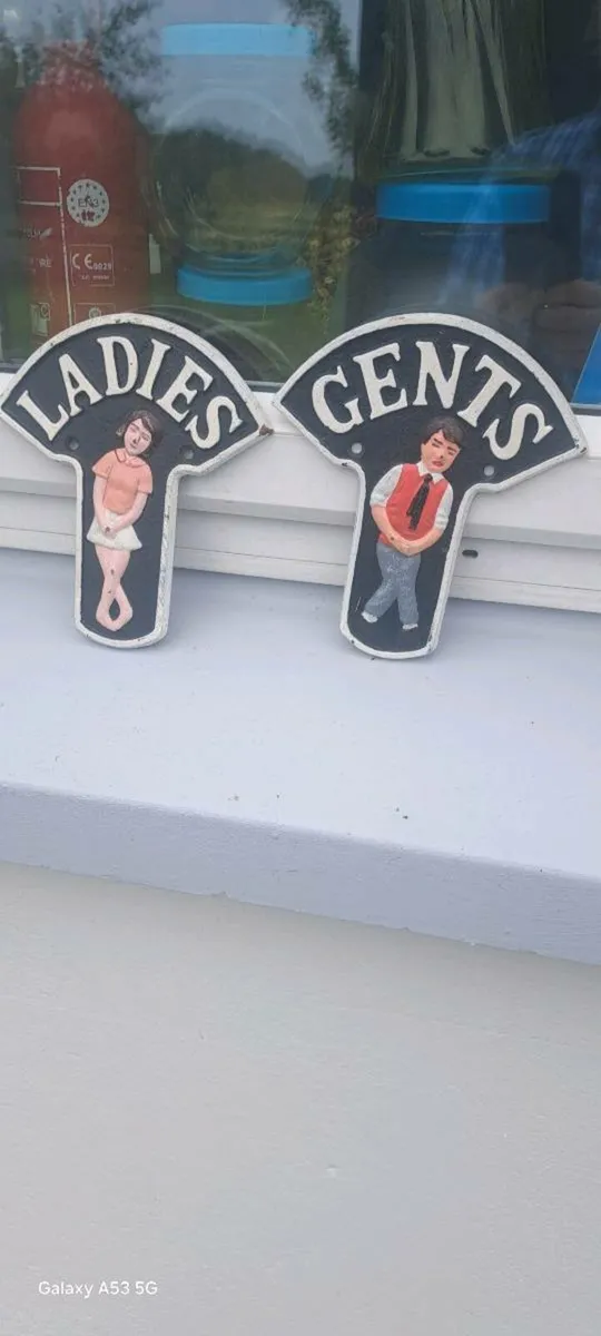 He's hers toilet signs