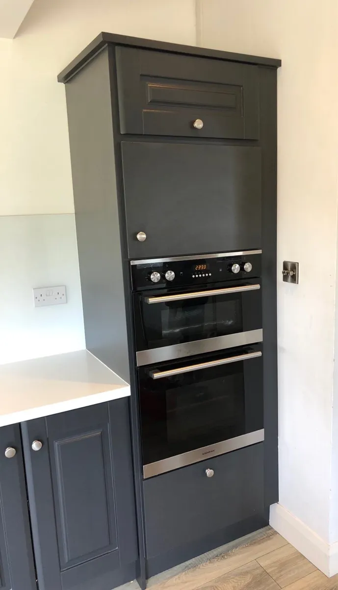 Kitchen , Appliances with Corian worktop . - Image 4