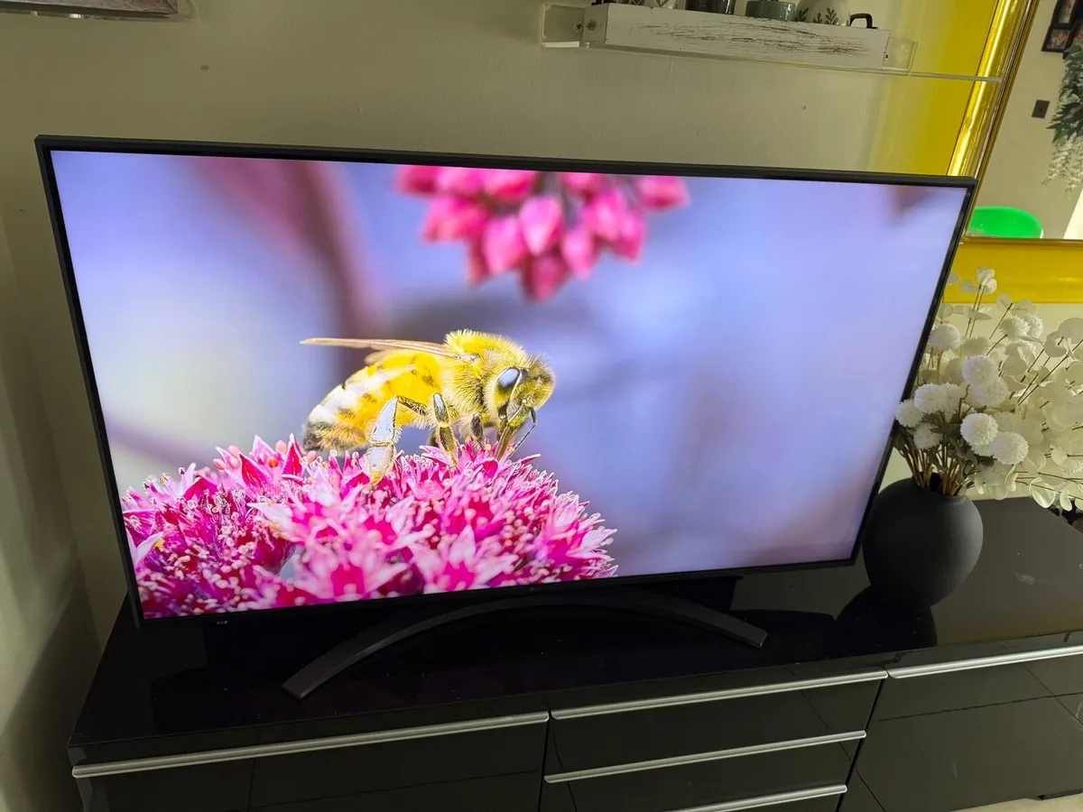 LG SMART 55” 4K ULTRA HD  Magic remote in swords - Image 1