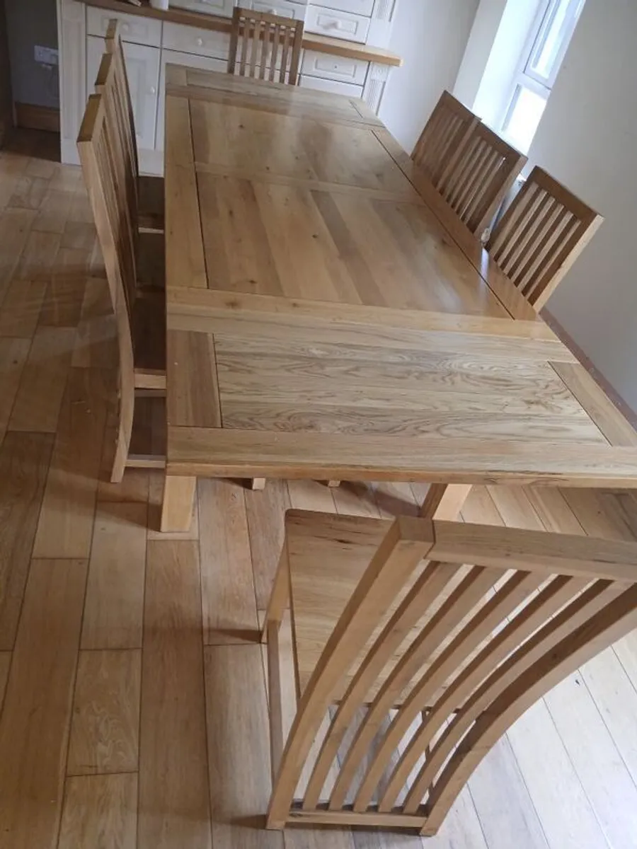 Solid oak dining table and 8 chairs. Very good condition - Image 4