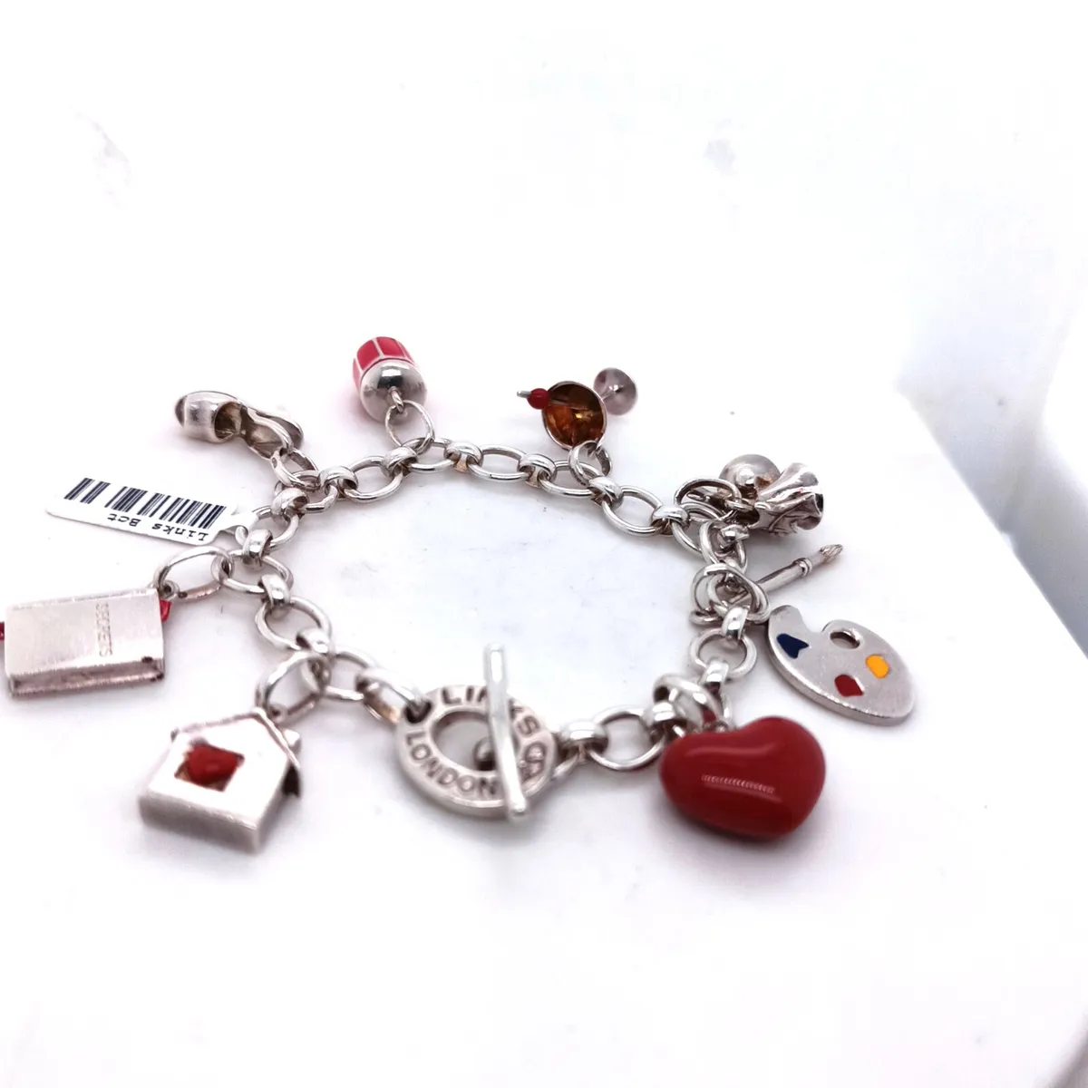 Links Silver Charm Bracelet with 8 Charms - Image 1