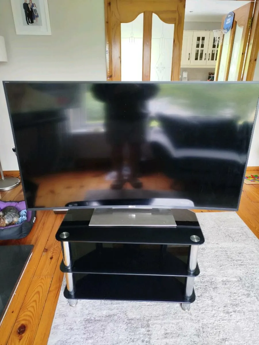 Sony Bravia 55" Curved TV with glass TV stand - Image 1