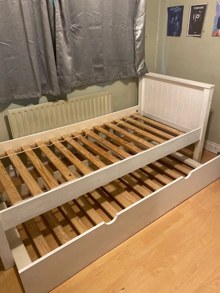Single bed frame with slide out sleepover bed - Image 1