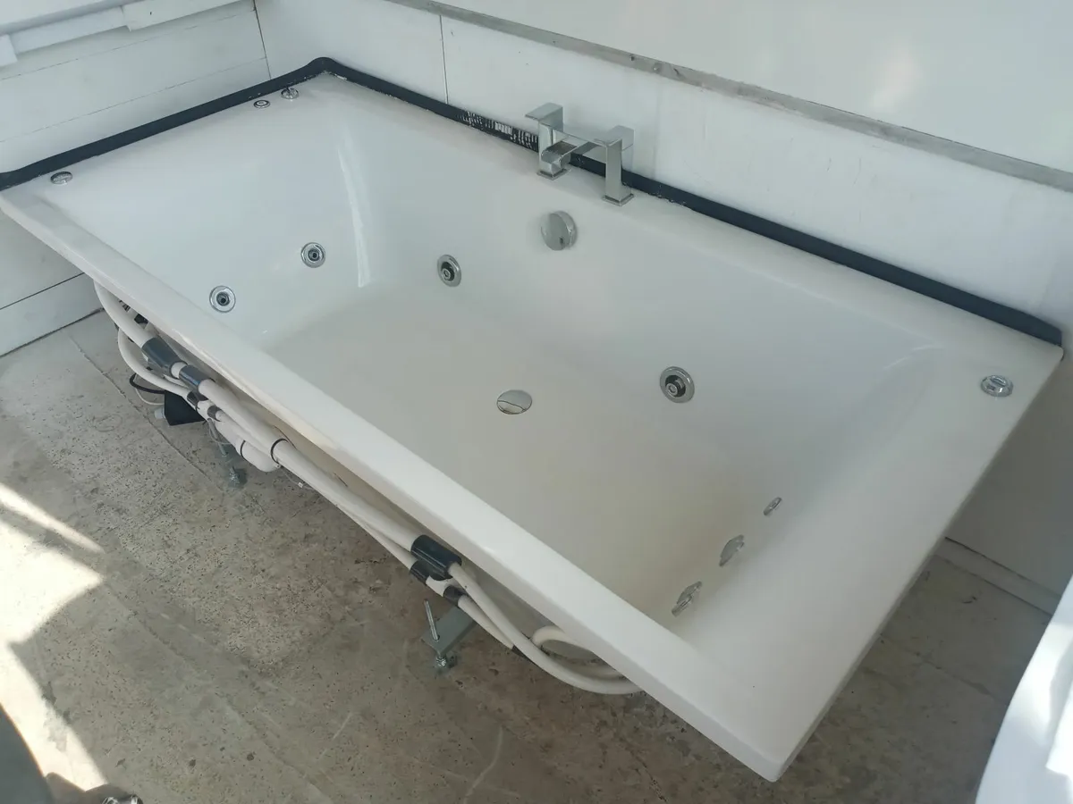 Delivery - Large Jacuzzi Bath with Taps - Image 1