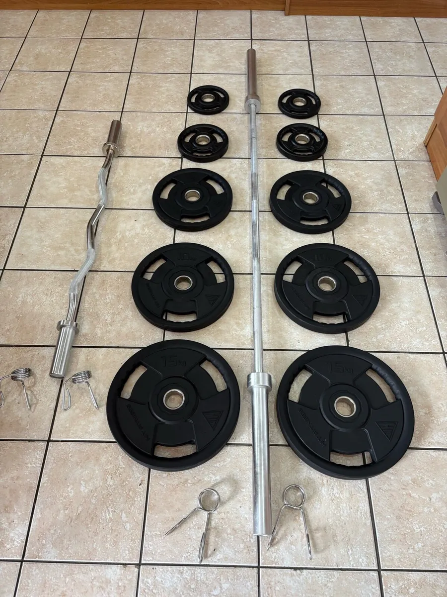 HIGH END URETHANE OLYMPIC PLATES AND BAR SET - Image 1