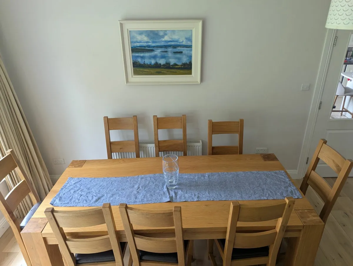 Large solid oak dining table and chairs - Image 3