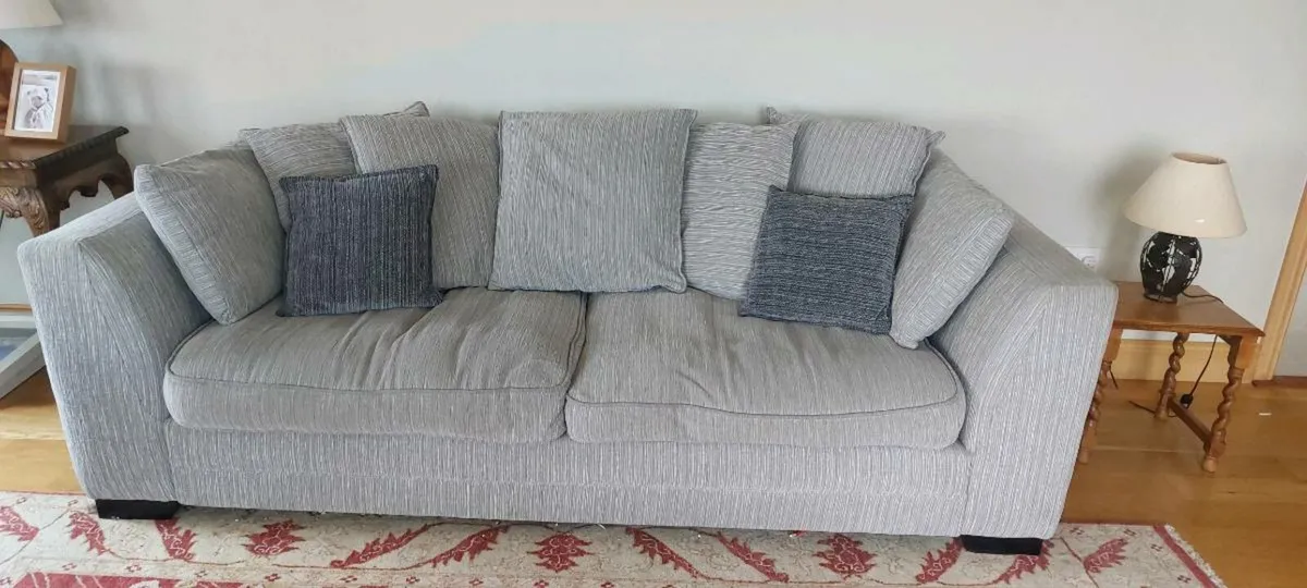 Grey 4 seater pillow back sofa and armchair - Image 1