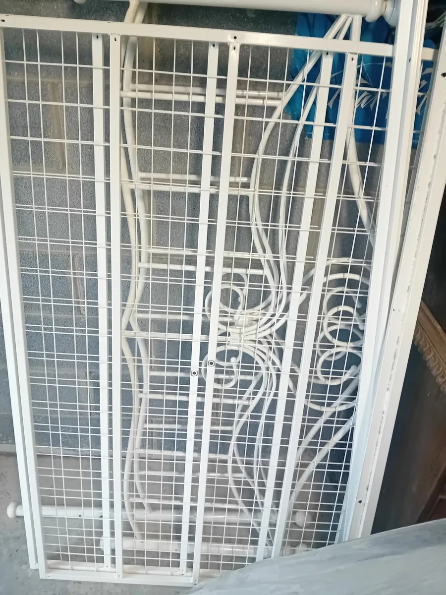 Metal frame double bed and mattress - Image 1