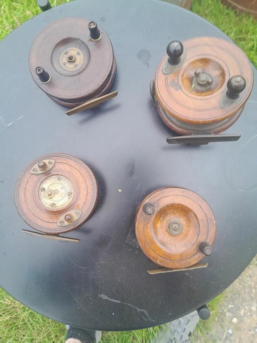 Four vintage wooden fishing rolls - Image 1