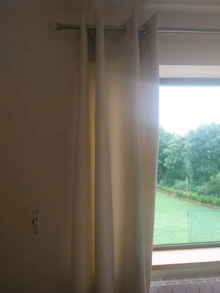 Eyelet cream curtains - Image 1