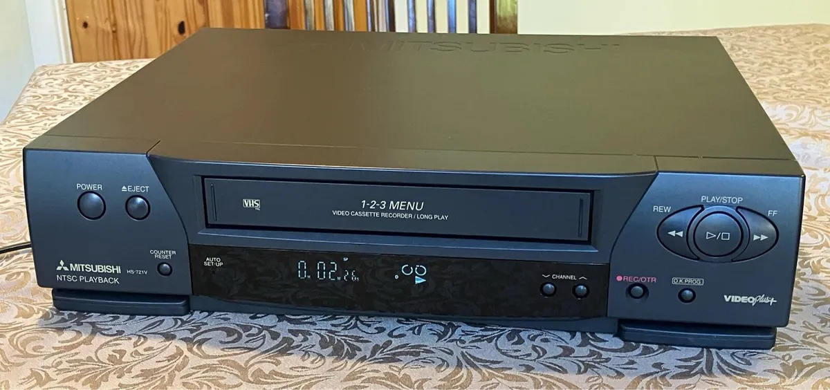 Mitsubishi HS721VR vhs recorder/player plus tapes - Image 1
