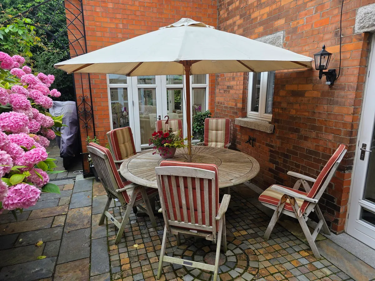 Patio table chairs cushions umbrella - Image 1