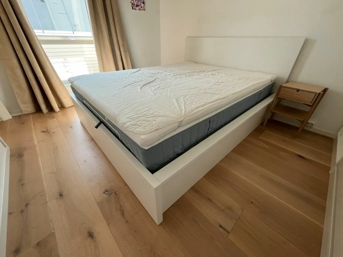 Ikea Malm Ottoman King Size bed & Hovag Mattress - Image 1