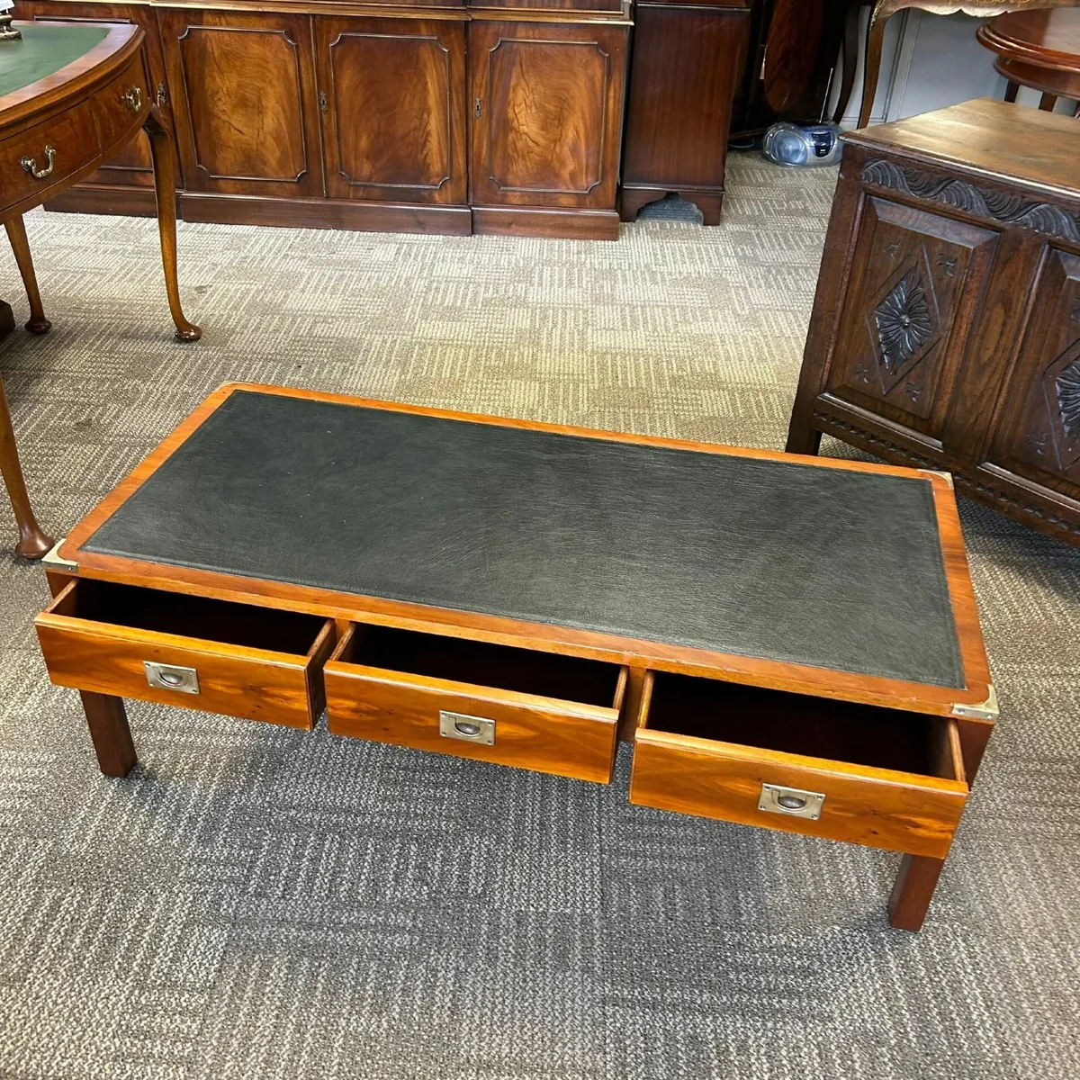 Fabulous green leather top campaign coffee table. - Image 1