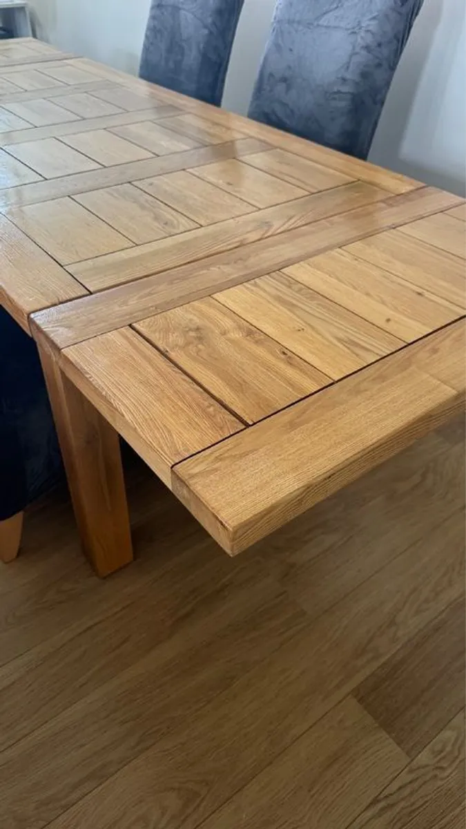 Solid Oak extendable dining room table and four chairs - Image 4